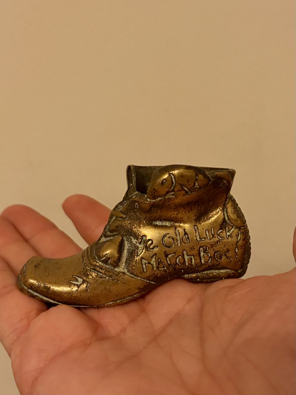 Brass boot match holder bought at The Salvation Army for £1.00