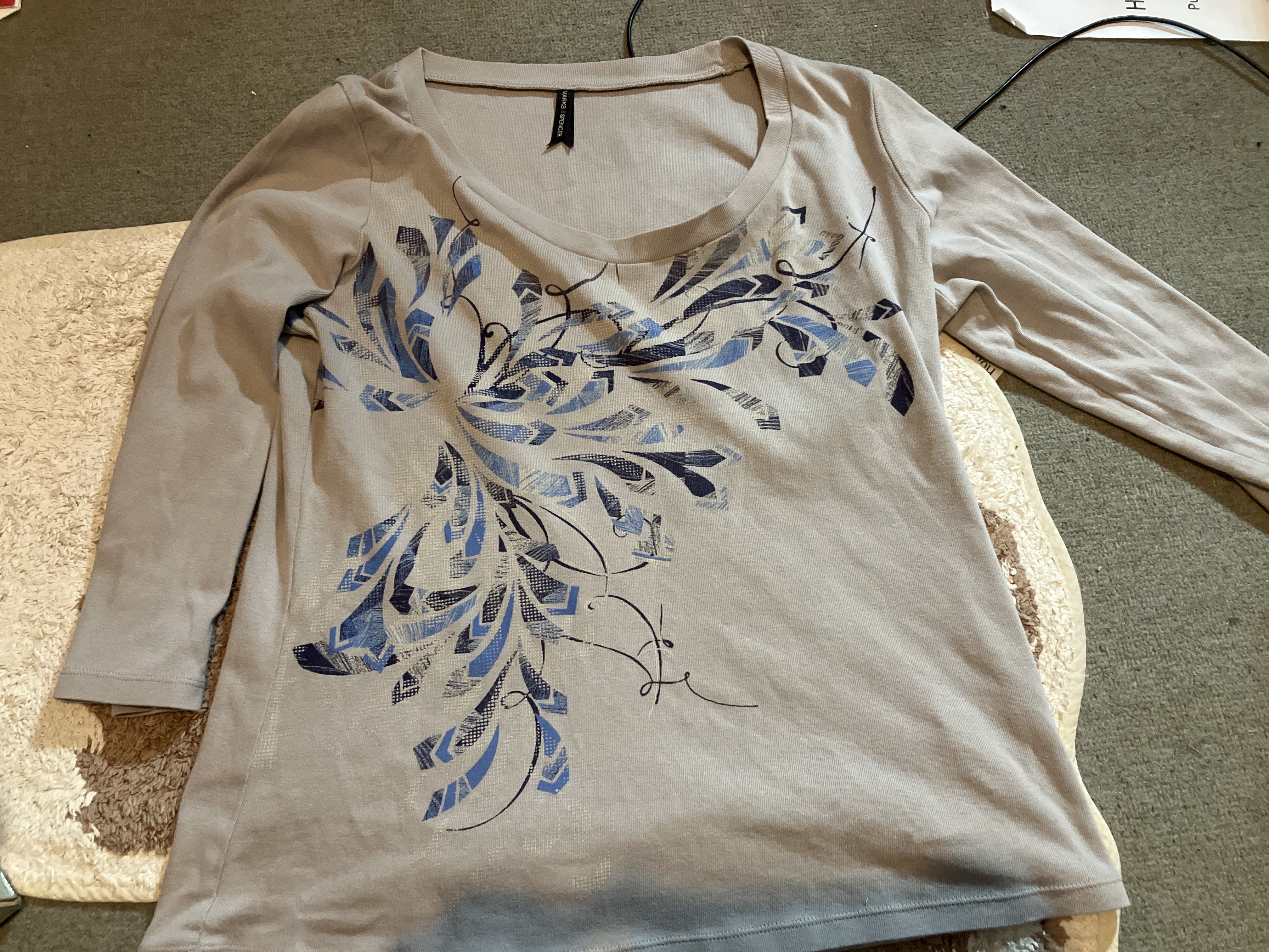 Y2K 3/4 sleeve top bought at C.A.S.E for £1.50