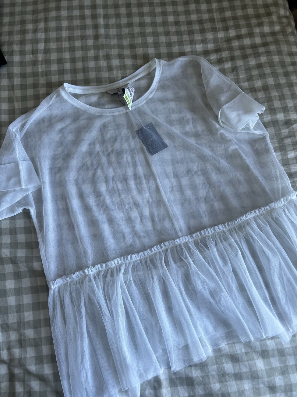 Next top with tags bought at Age UK for £3.00