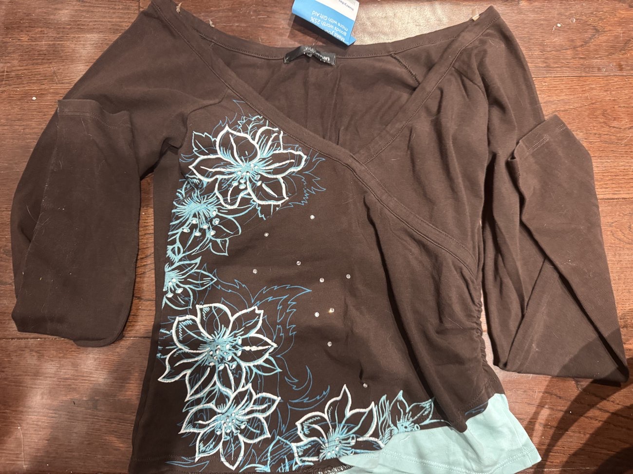 brown and turquoise long sleeve product bought at Sue Ryder for £4.00