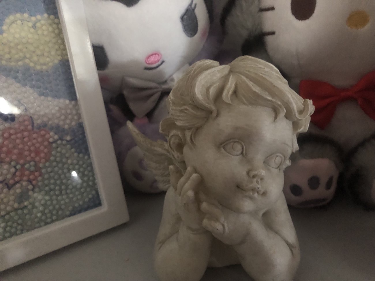 super cute cherub ornament bought at St Leonard's Hospice Shop for £2.00