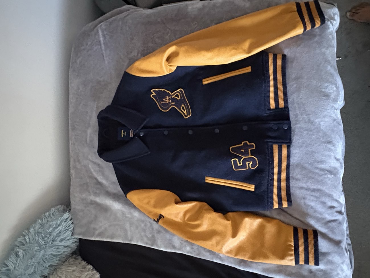 Superdry varsity jacket bought at The Children's Society for Β£7.99