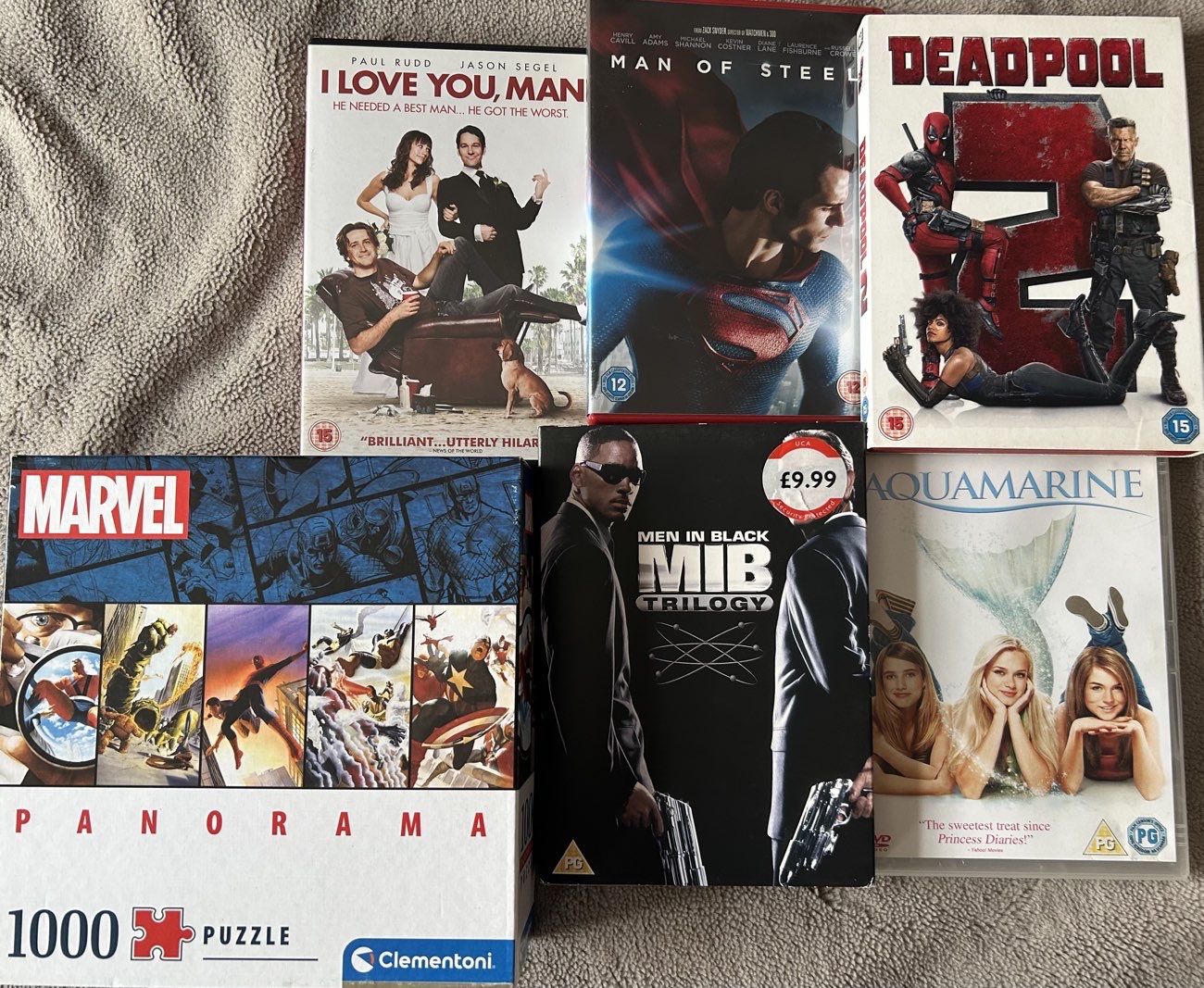 1000 Piece Puzzle and 5 DVDs (5 for £1 offer) bought at Cancer Research UK for £4.00