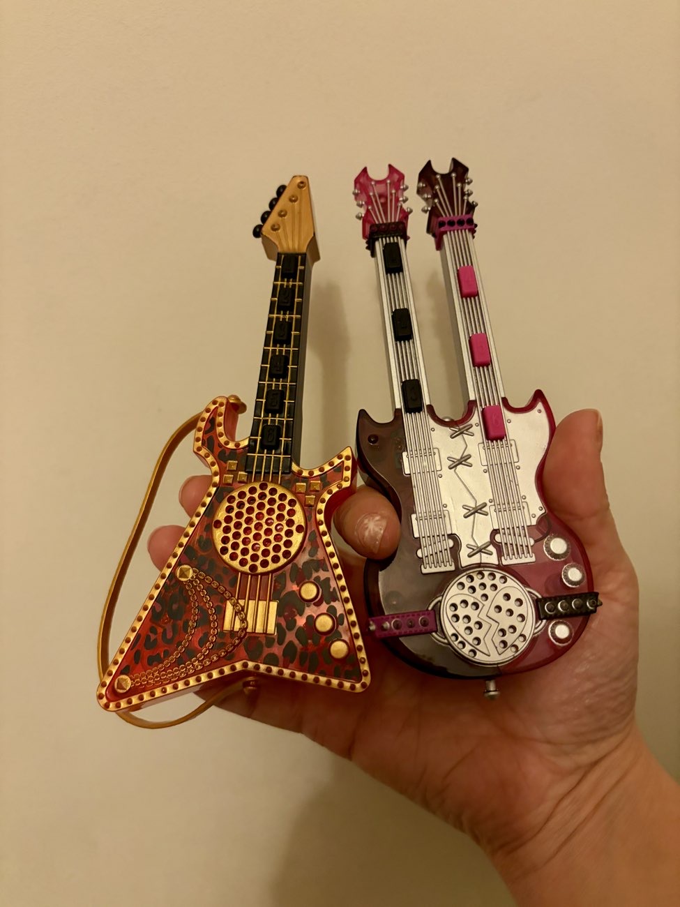 Musical toy guitars for LOL Surprise dolls. bought at Hindlip Car Boot Sale
