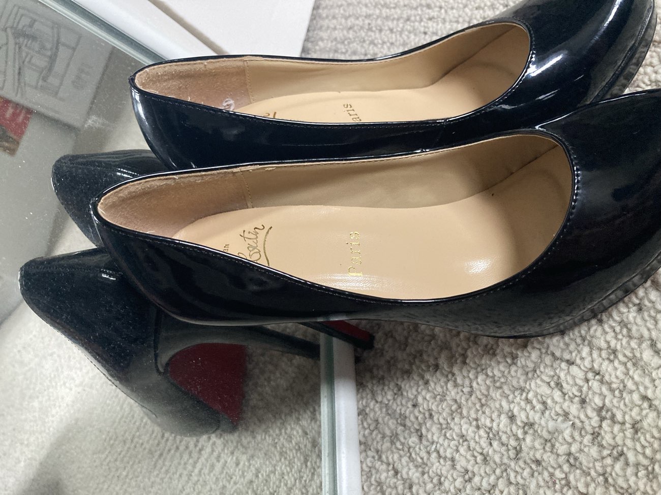 Christian Louboutin heels product bought at Age UK for £4.99
