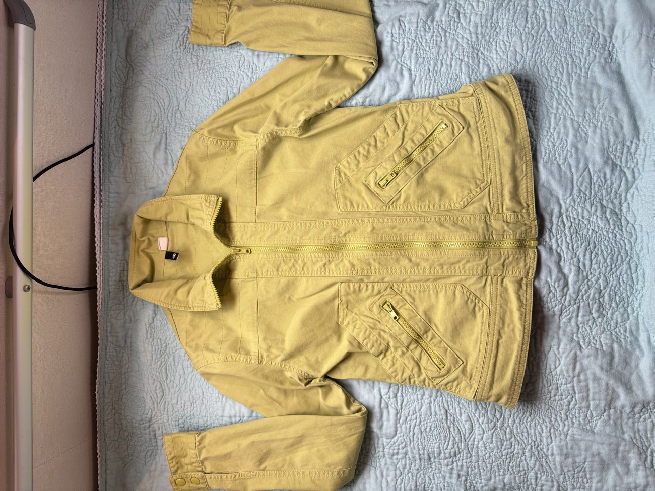 green jacket product bought at Age UK Charity Shop for £7.50