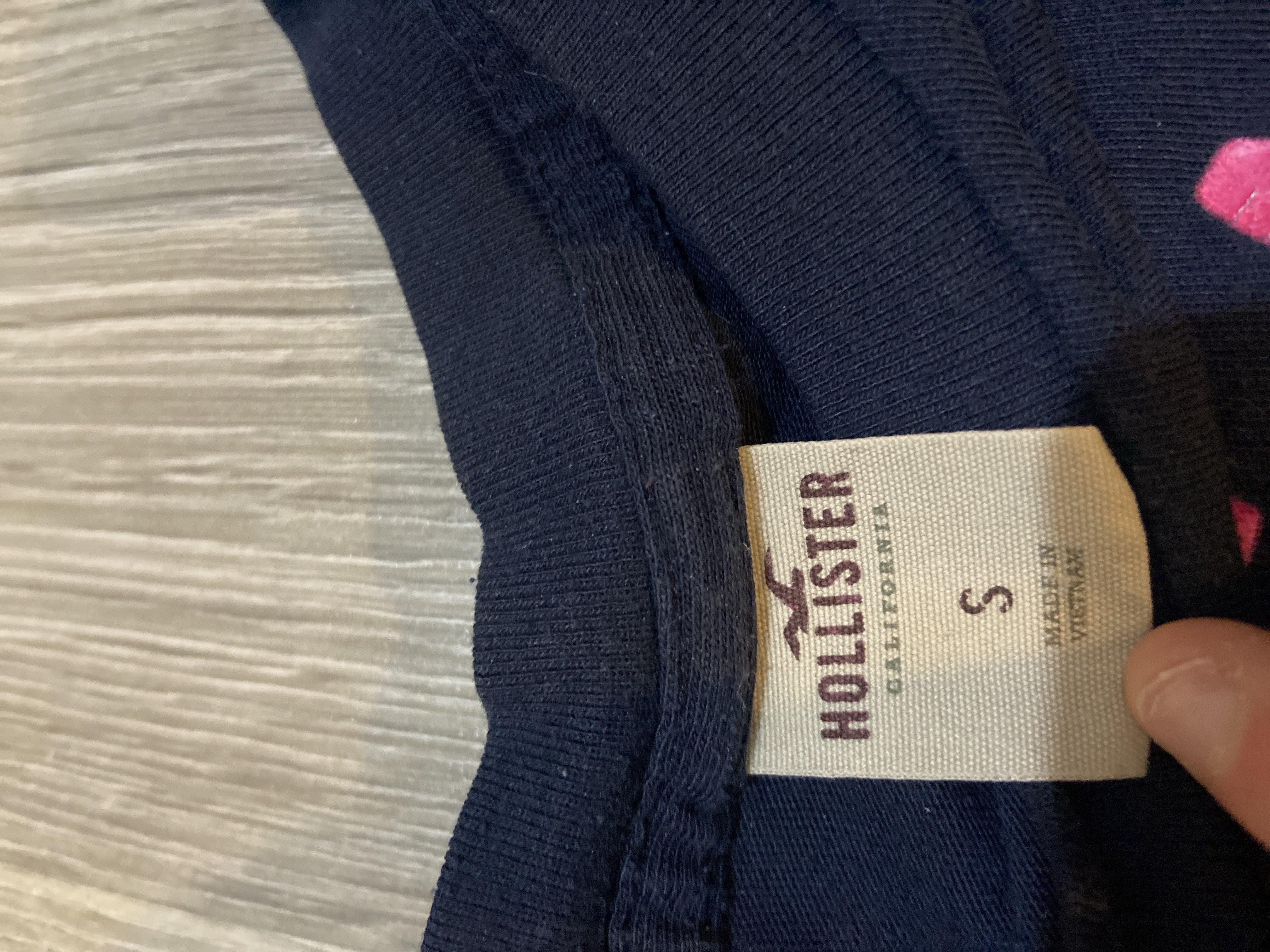 Holister baby tee product bought at Lewis-Manning Hospice for £4.00