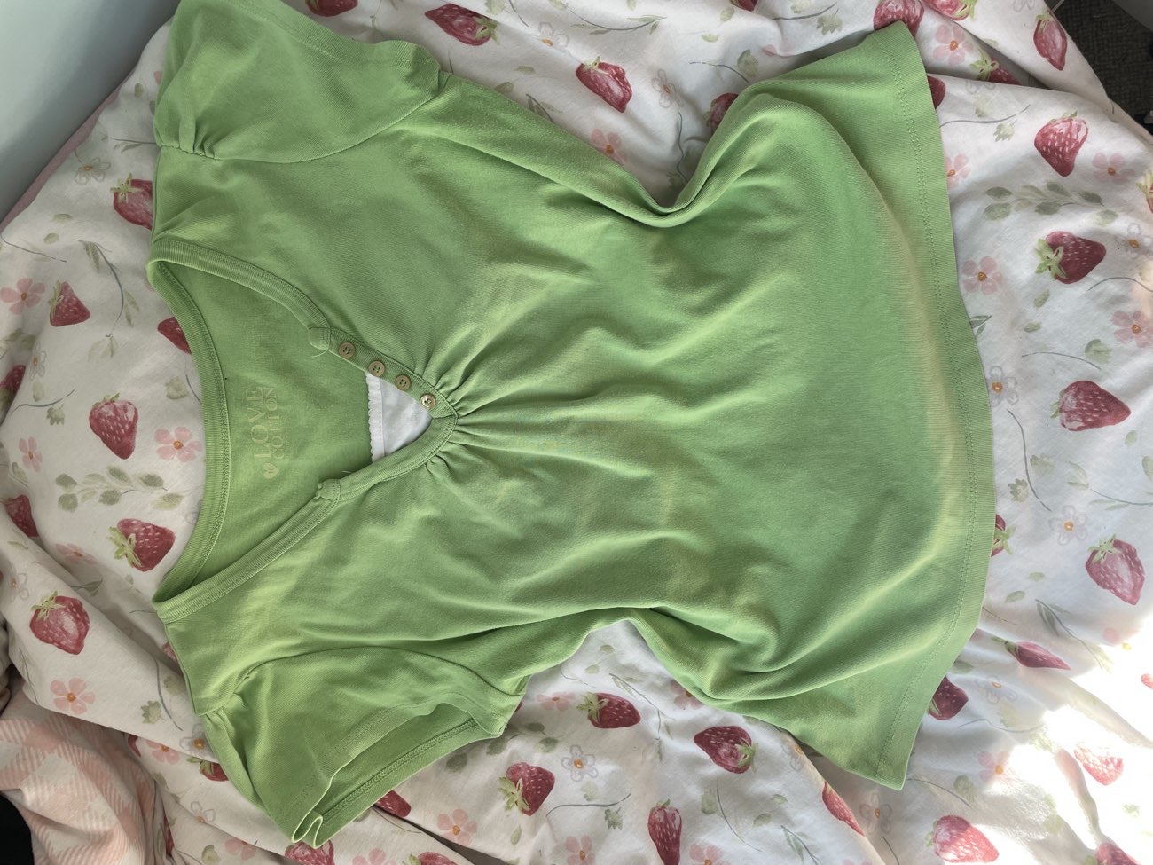 Ended up being too big but the cutest layered green top with button details 🥹🥹 bought at Sue Ryder for £3.00
