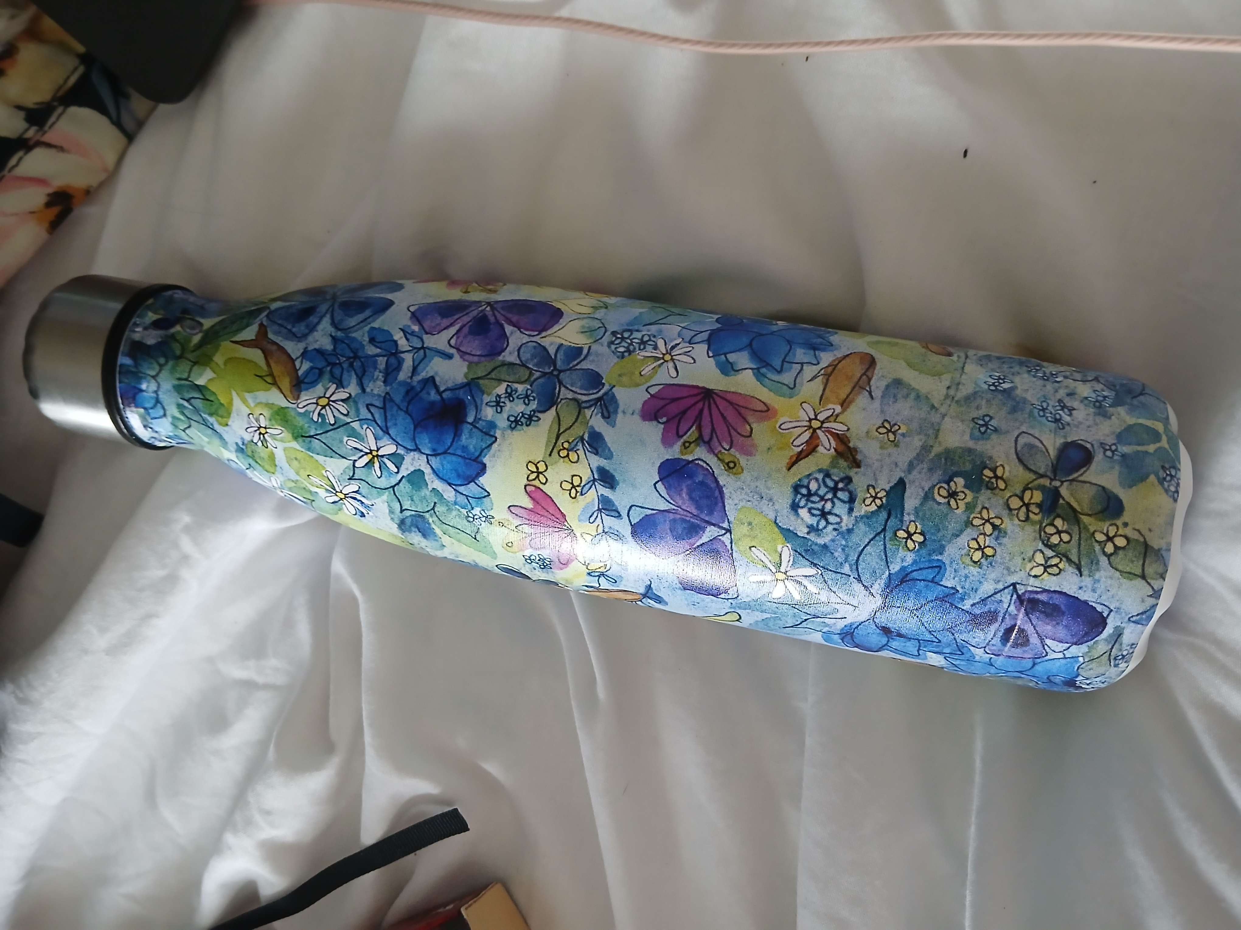 Cute water bottle design, a part of their many collections by disabled artists bought at Scope for £11.50