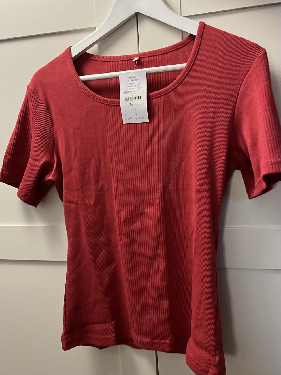 Red short sleeve top bought at Woodgreen Pets Charity for Β£1.50