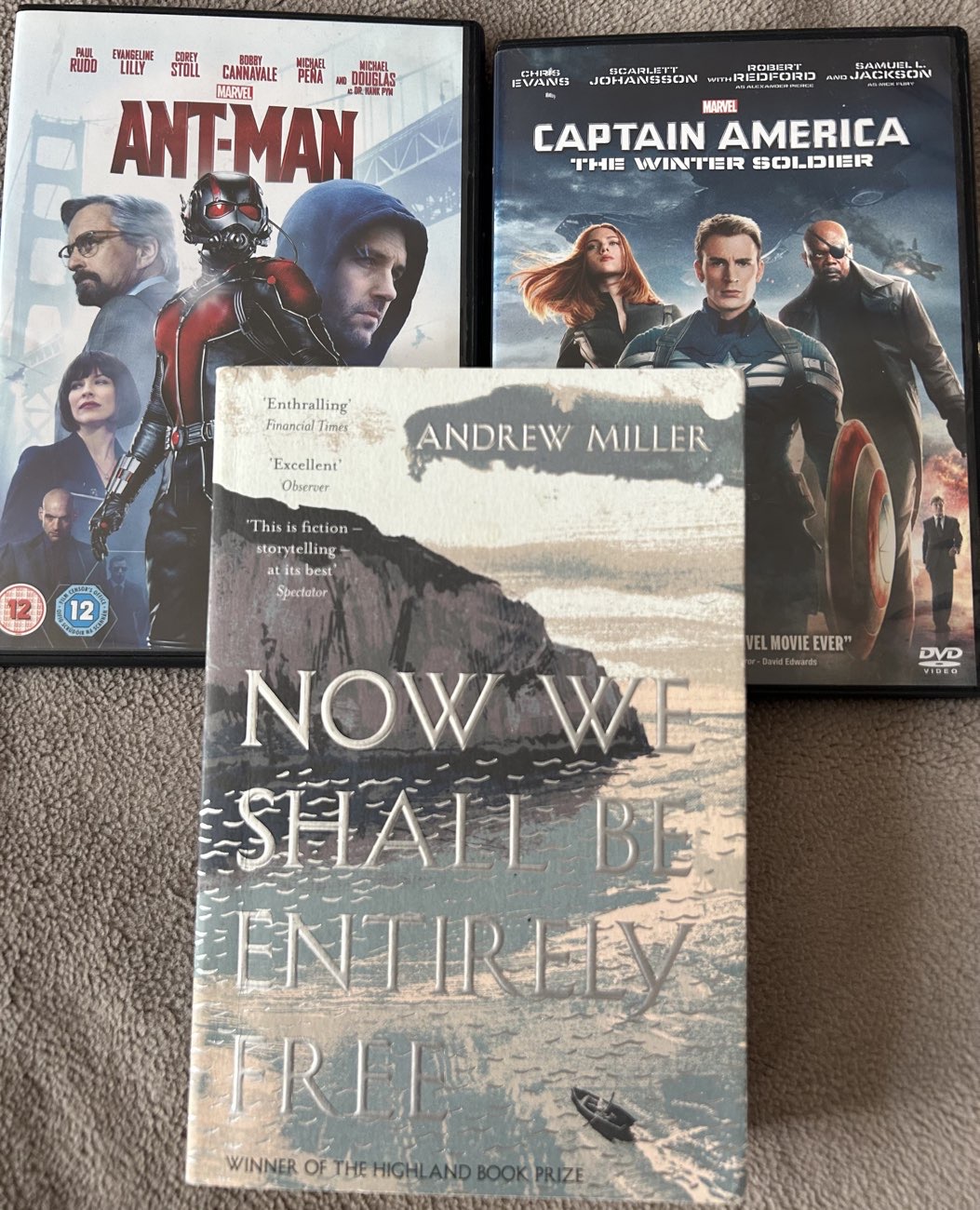 Marvel DVDs and a Book bought at PDSA for £1.99