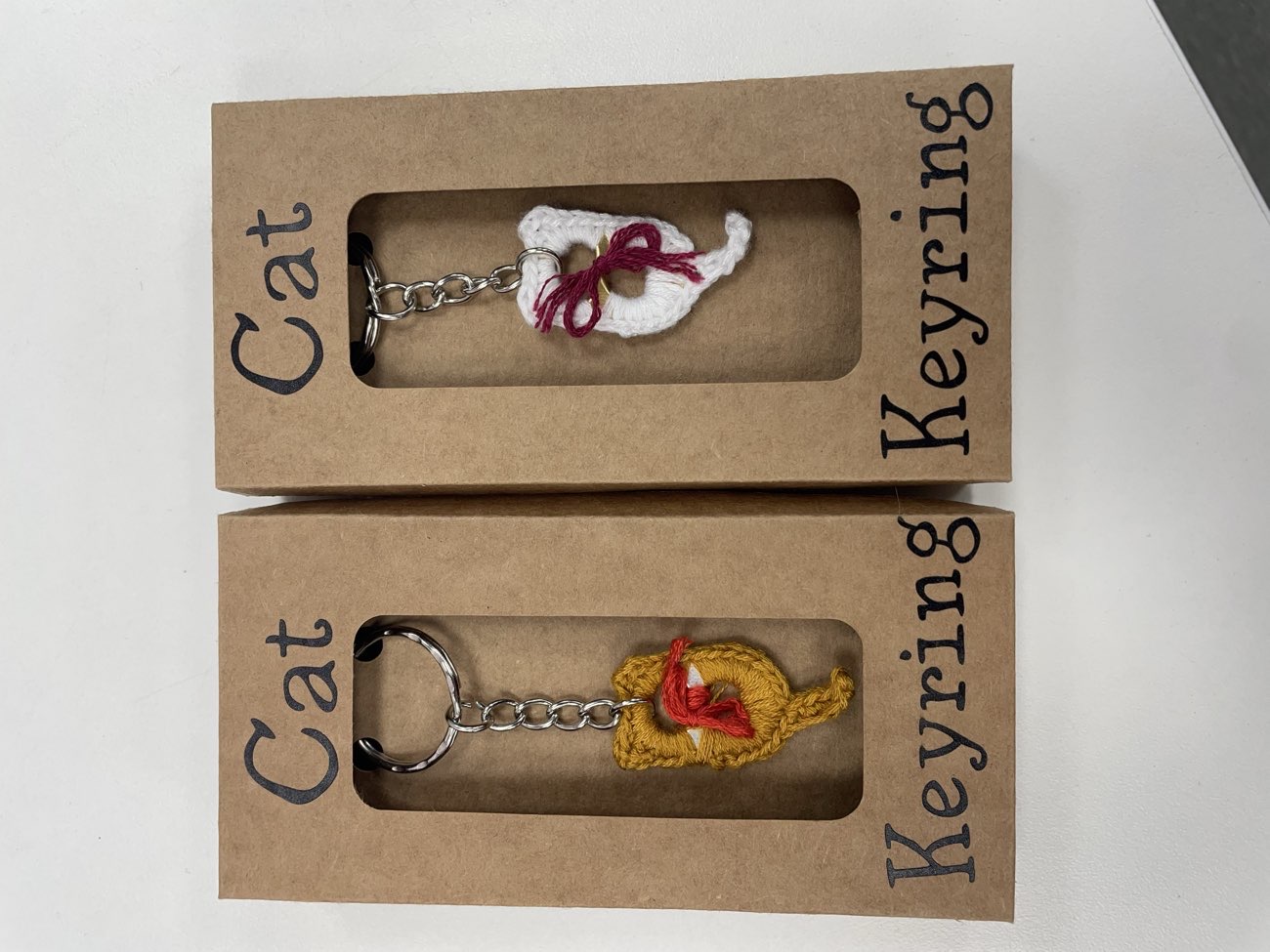 Orange and White Soda Tab Cat Keyring product bought at Hope House Flint Shop for £1.00
