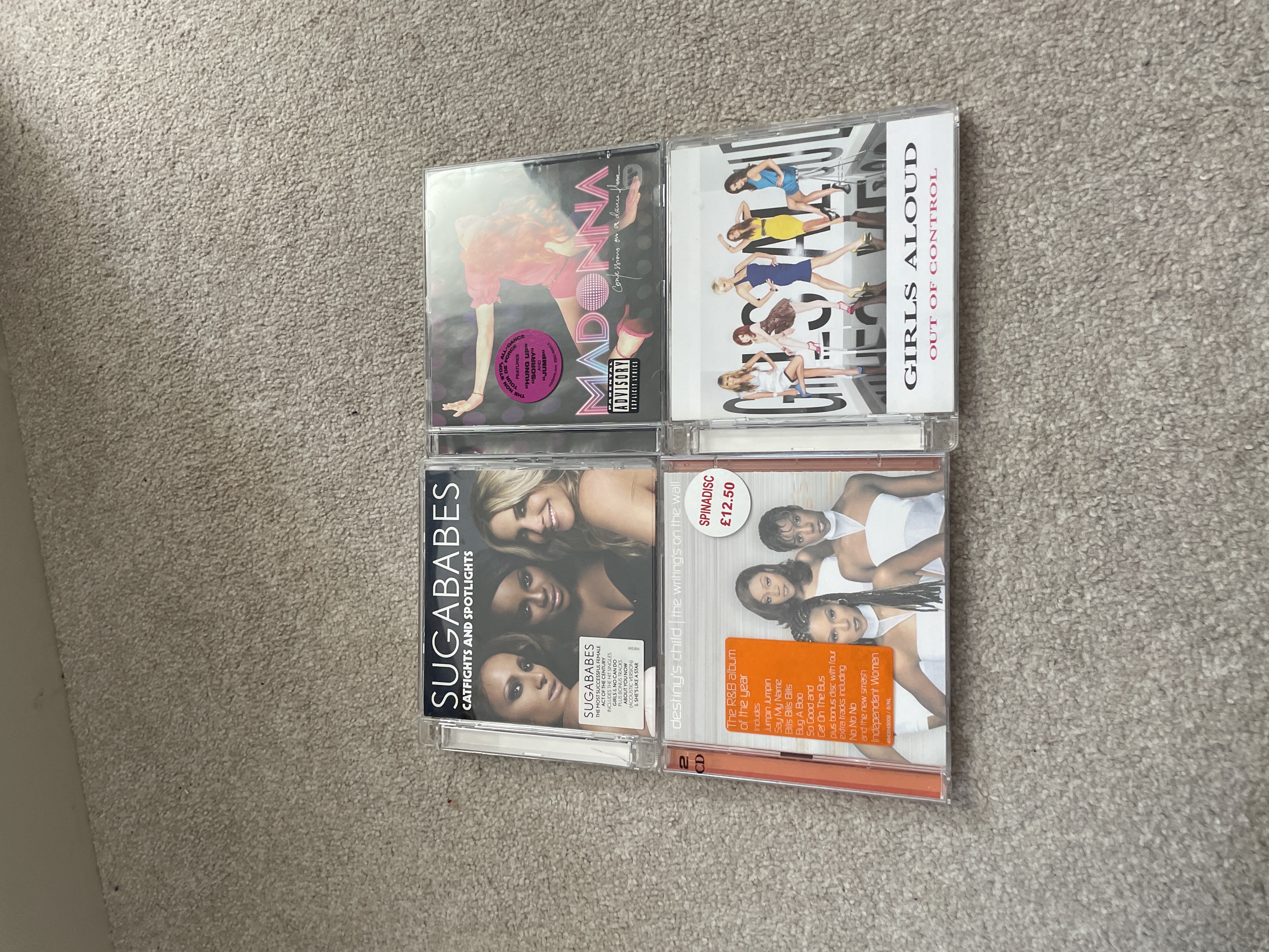 four 2000s cds product bought at Sue Ryder for £4.00