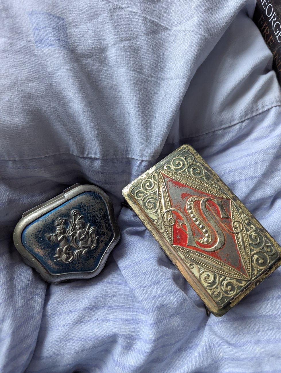 Trinket cases gold and silver bought at The Salvation Army for Β£5.00