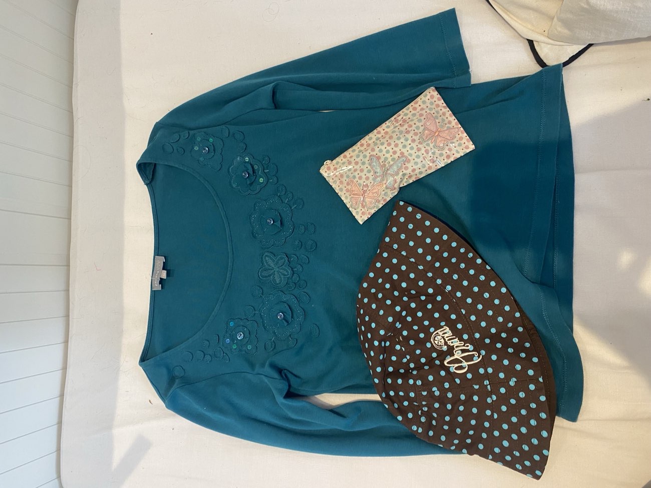 cute teal top, y2k reversible animal hat and accessorise mini purse! x -price is for all bought at Princess Alice Hospice for £10.50