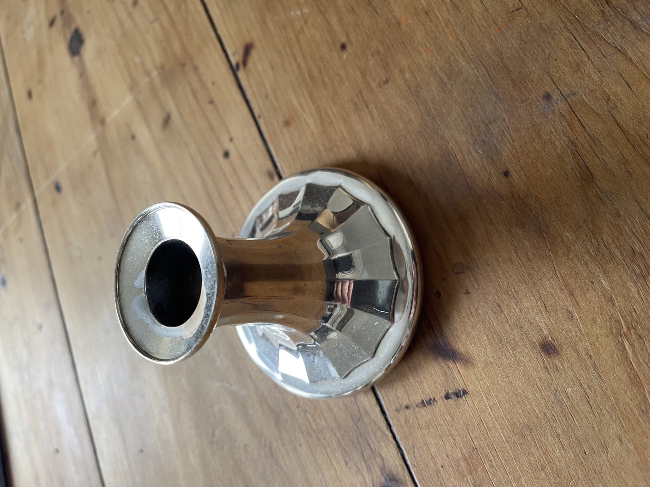 Candlestick, silver plated (reselling at £10) bought at Salvation Army for £2.00