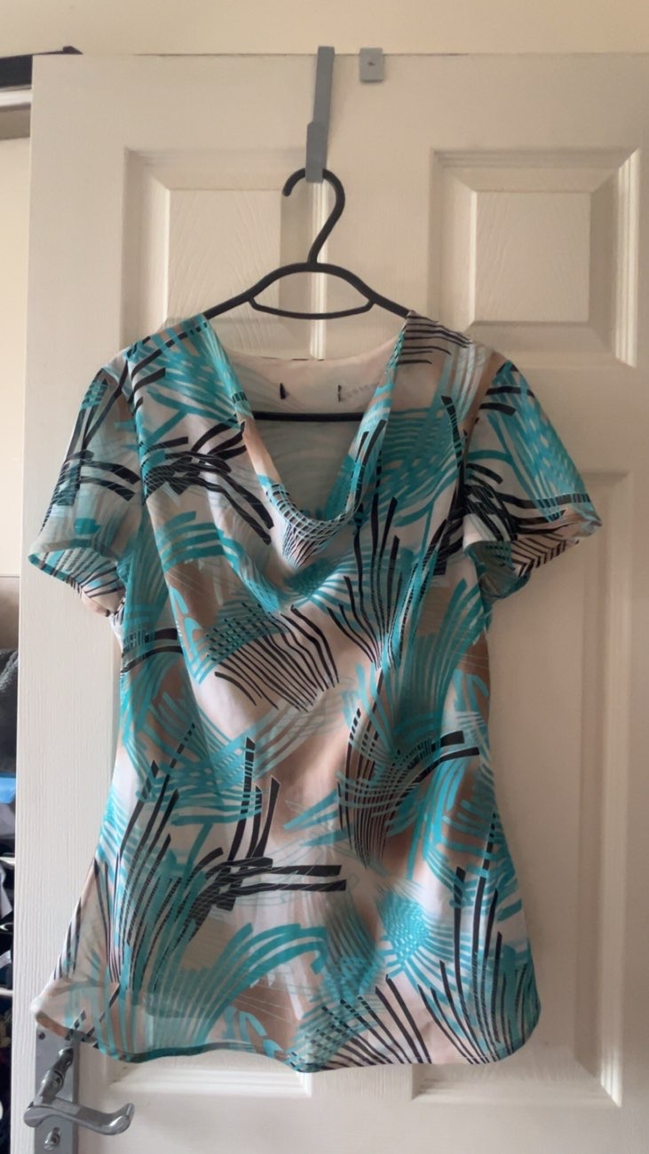 floral shirt sheer bought at Peace Hospice Care for £2.00