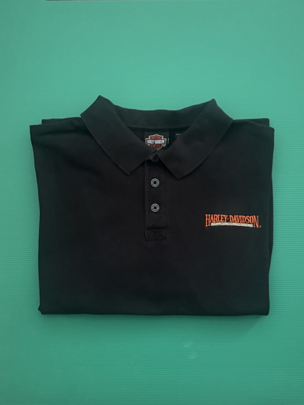 Harley Davidson large black polo shirt bought at British Heart Foundation