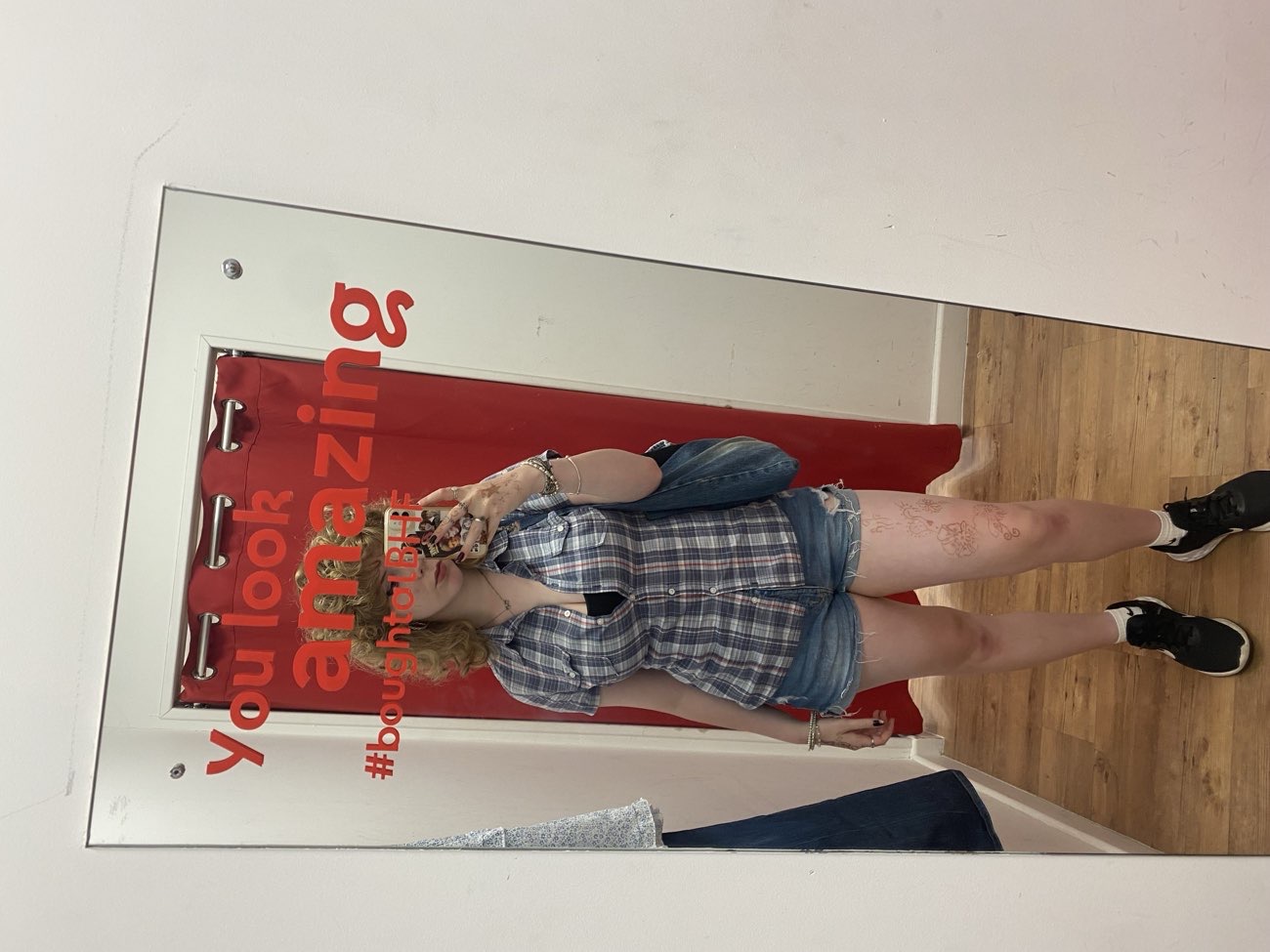 checked shirt, USA skirt and brown/blue baby doll top bought at The Salvation Army