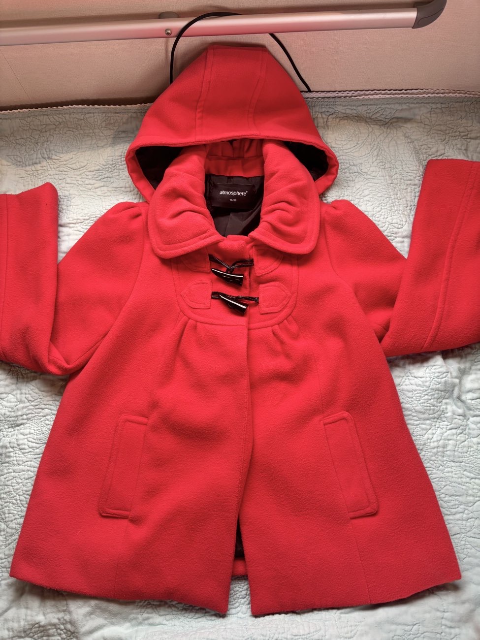 red coat! with hood 🤭 product bought at Sense for £10.00
