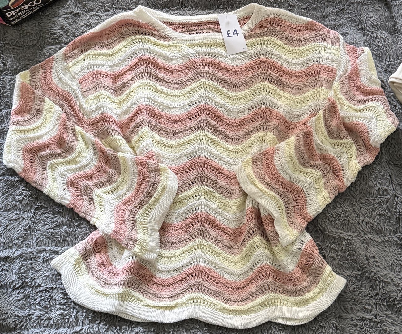 Wavy pastel sweater product bought at Cancer Research UK for £4.00