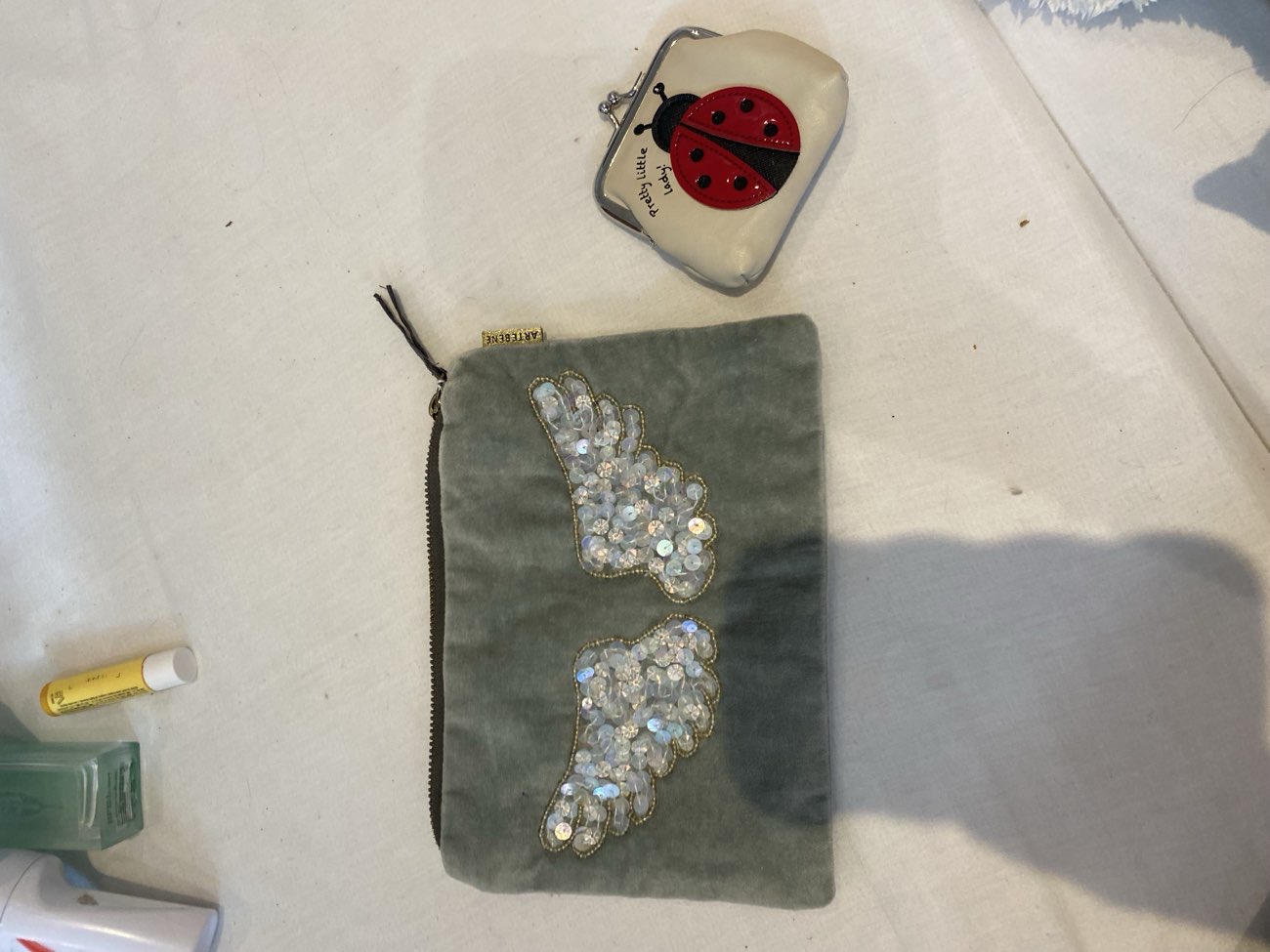 cute teal angel purse as well as ladybug wallet! x -price for both product bought at Cancer Research UK for £4.00