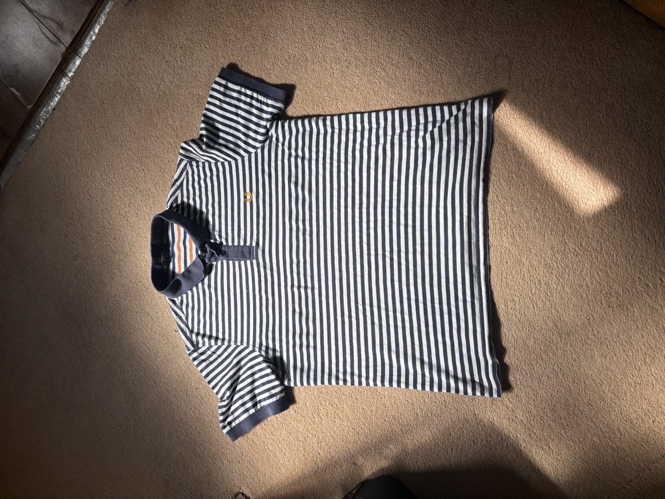 Fred Perry stripped polo shirt bought at Sue Ryder for £7.00