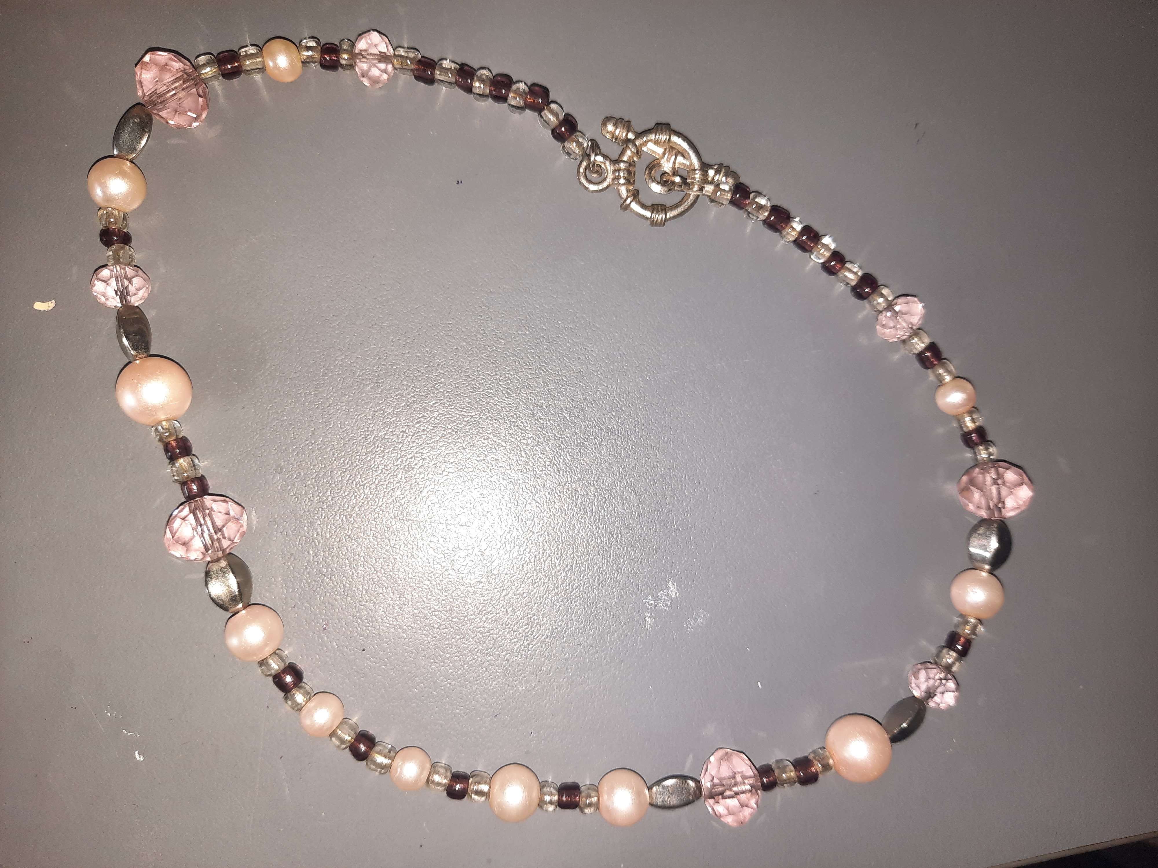 Pinky purple necklace with pearls product bought at Irish Cancer Society