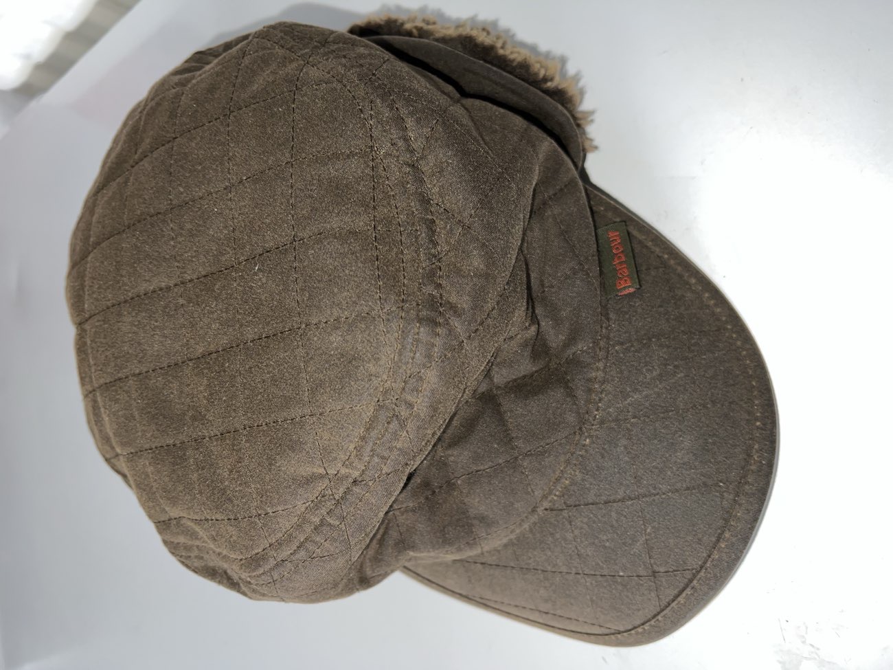Barbour hat product bought at Compton Care Shop for £1.50