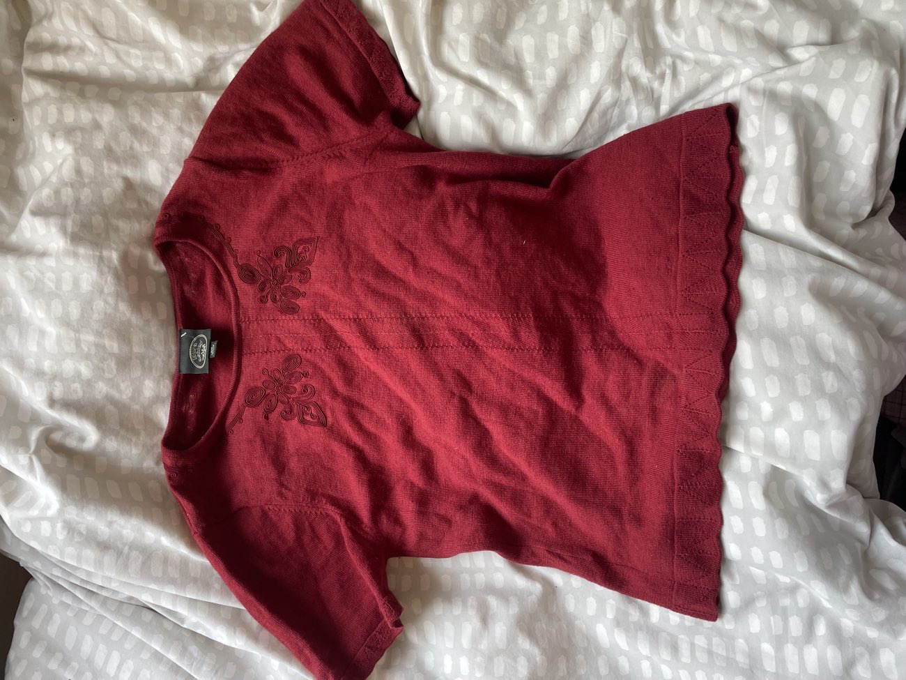 Laura Ashley wool baby tee product bought at The Salvation Army for £3.00