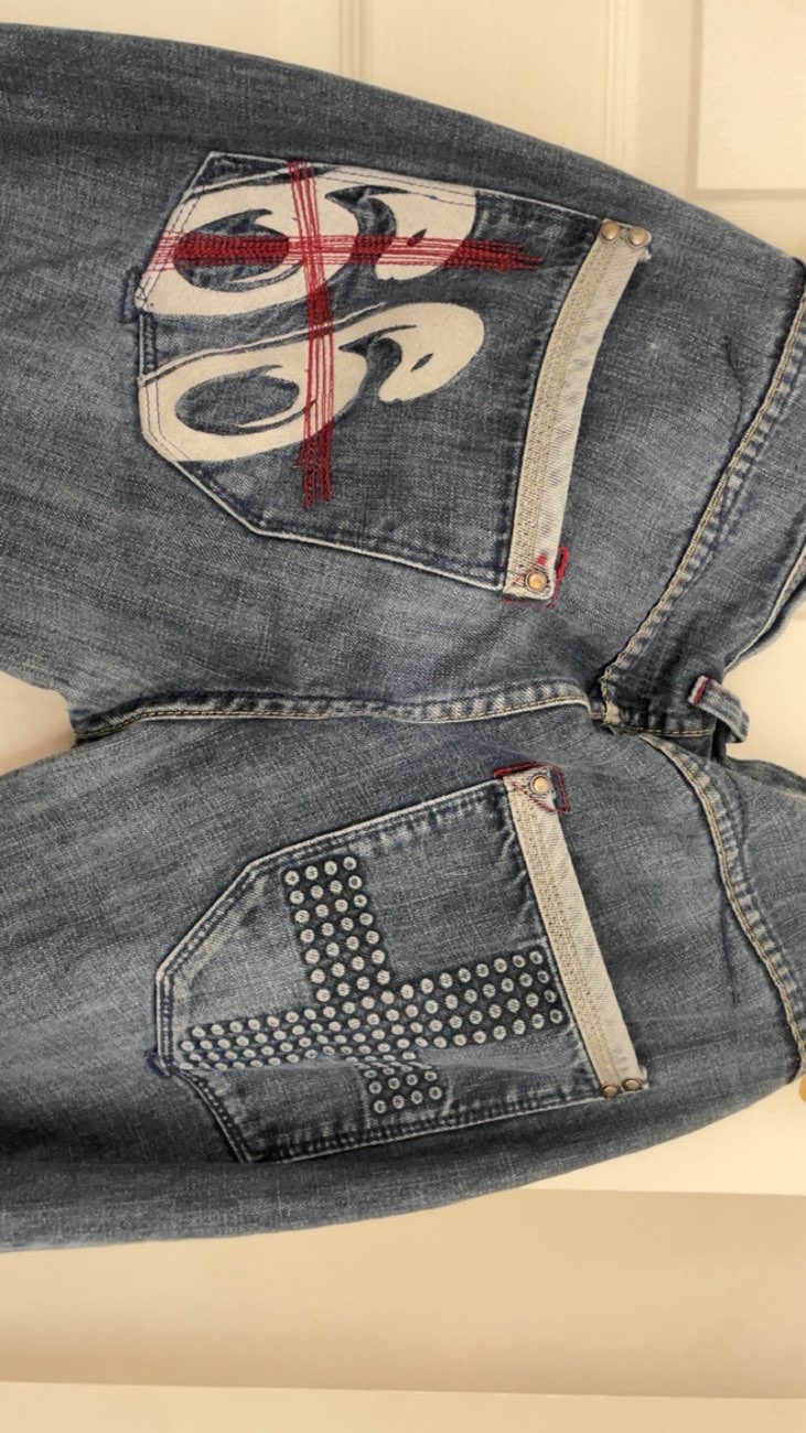 Embroidered baggy jeans bought at Cancer Research Wales for £3.50