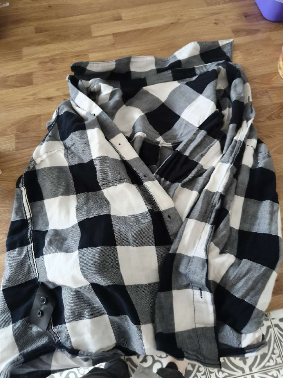 Flannel shirt product bought at Farplace Animal Rescue for £2.00
