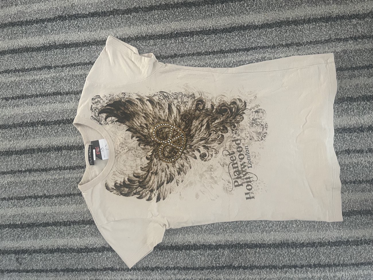 Planet Hollywood gem 🥹 bought at Isabel Hospice for £3.00