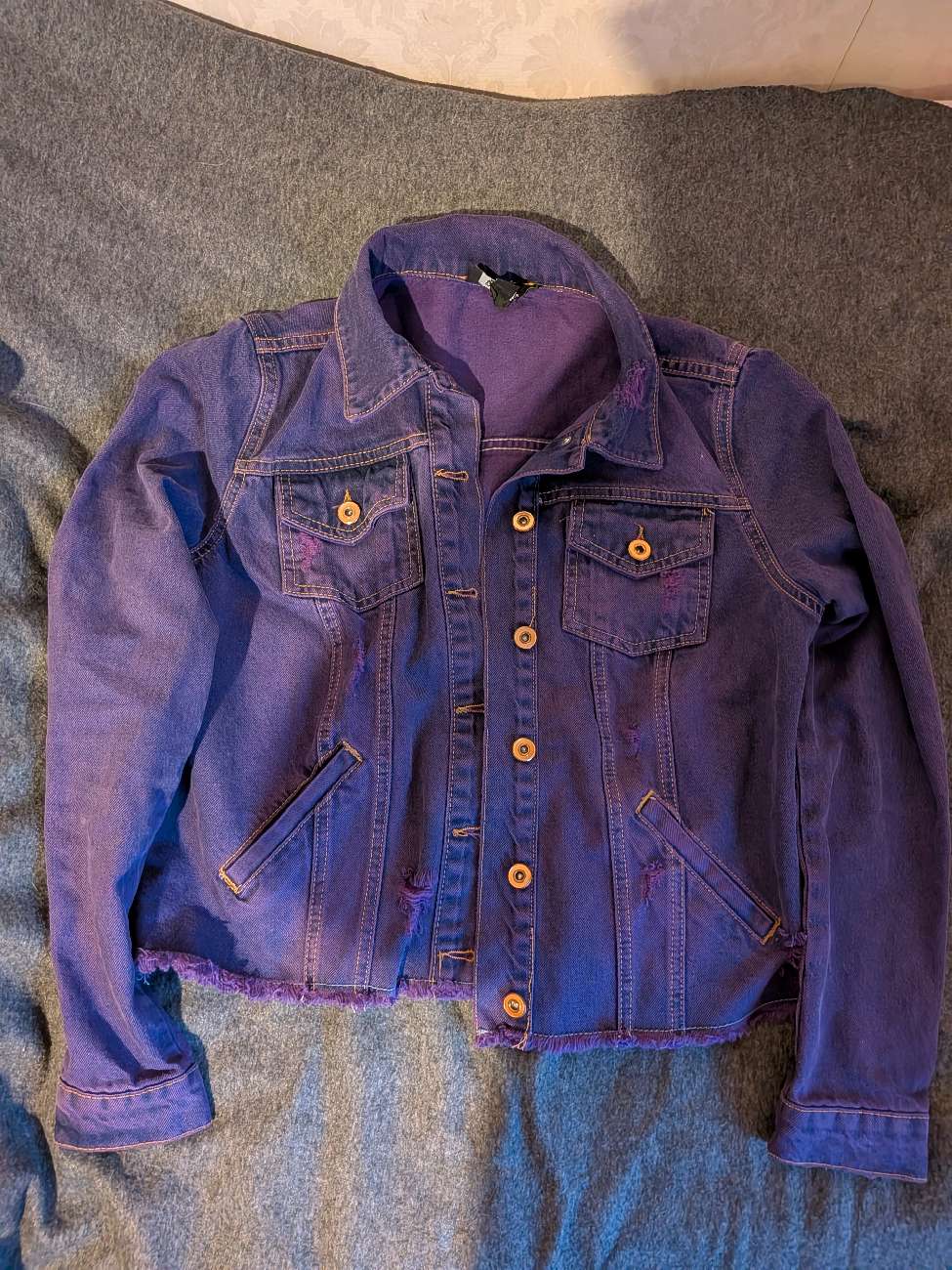 Purple distressed denim jacket bought at Carlton Antiques