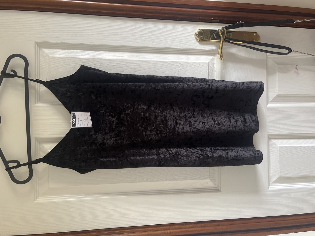 A black hollister dress, and a colourful skirt bought at PACT Animal Sanctuary Charity Shop for £14.00