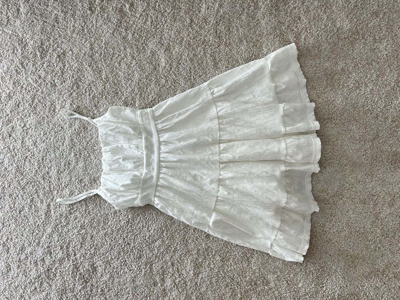 white mini dress bought at Claire House for £3.50
