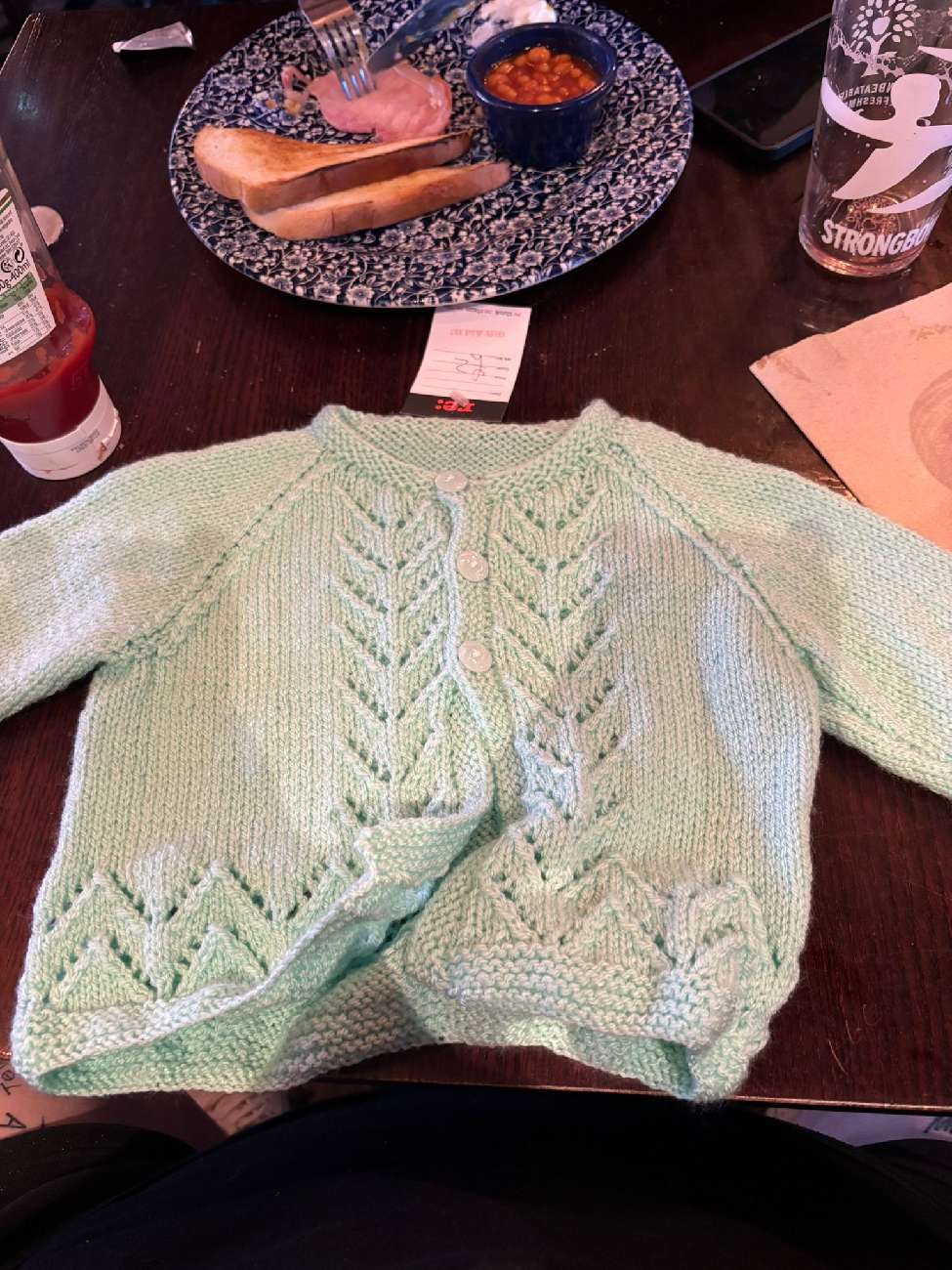 Baby cardigan product bought at PDSA for £2.00