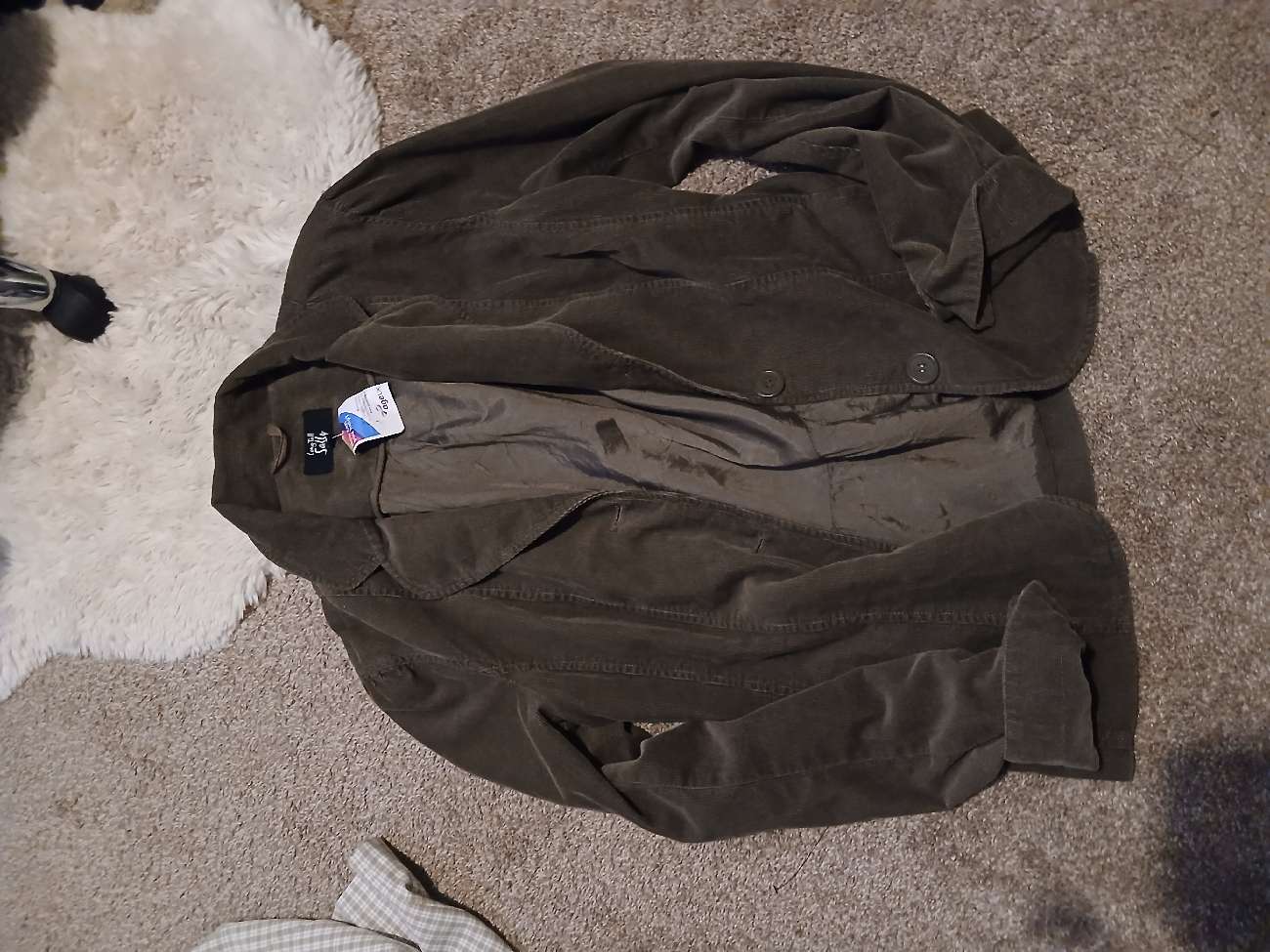 Green jacket bought at Age UK Charity Shop for Β£4.00