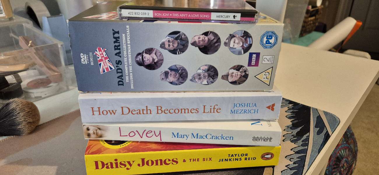 Books, Dad's Army DVDs and Bon Jovi CD bought at The Hangar by Wisdom Hospice for £6.00