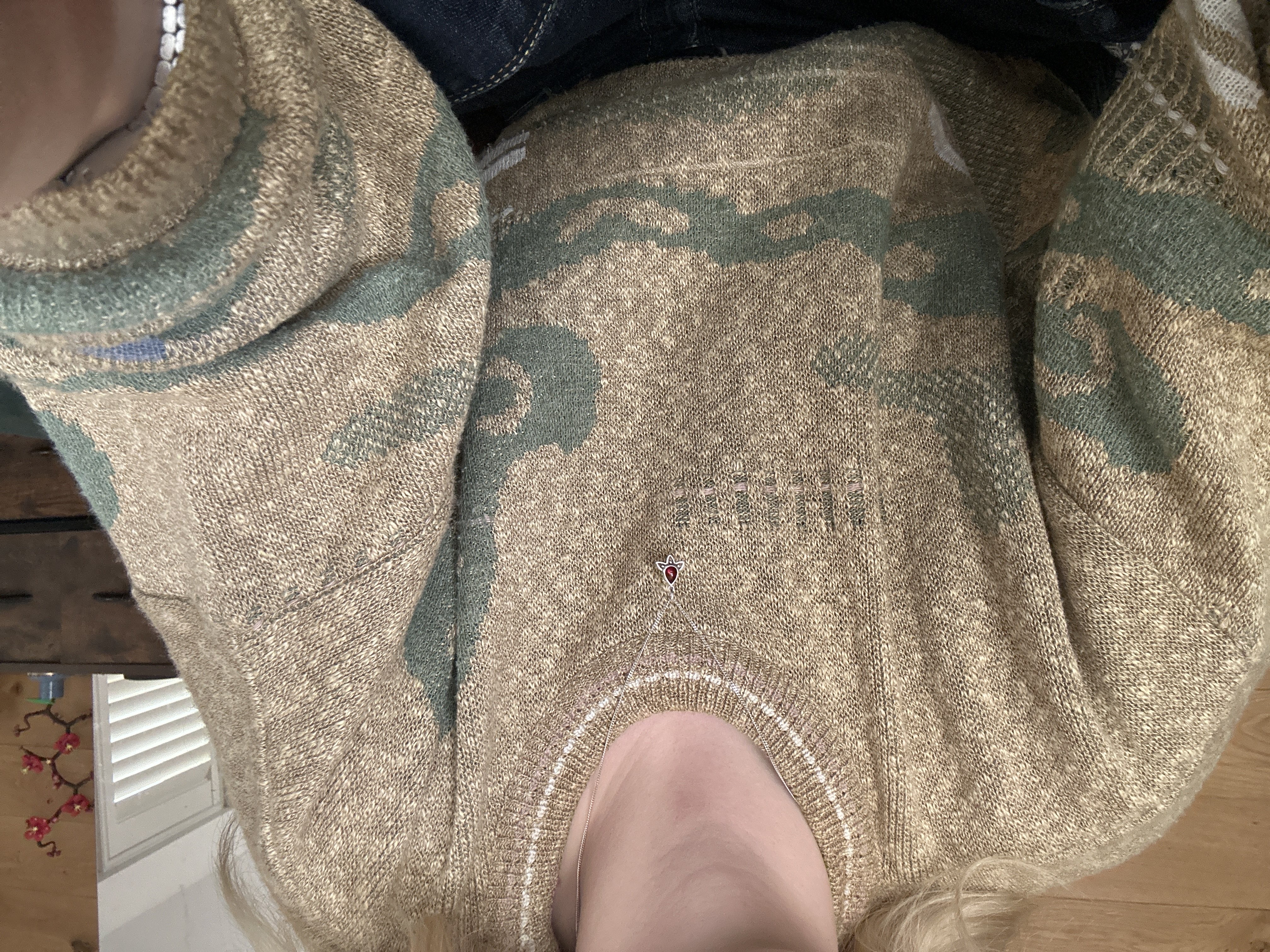 green sweater bought at Pop Boutique for £20.00