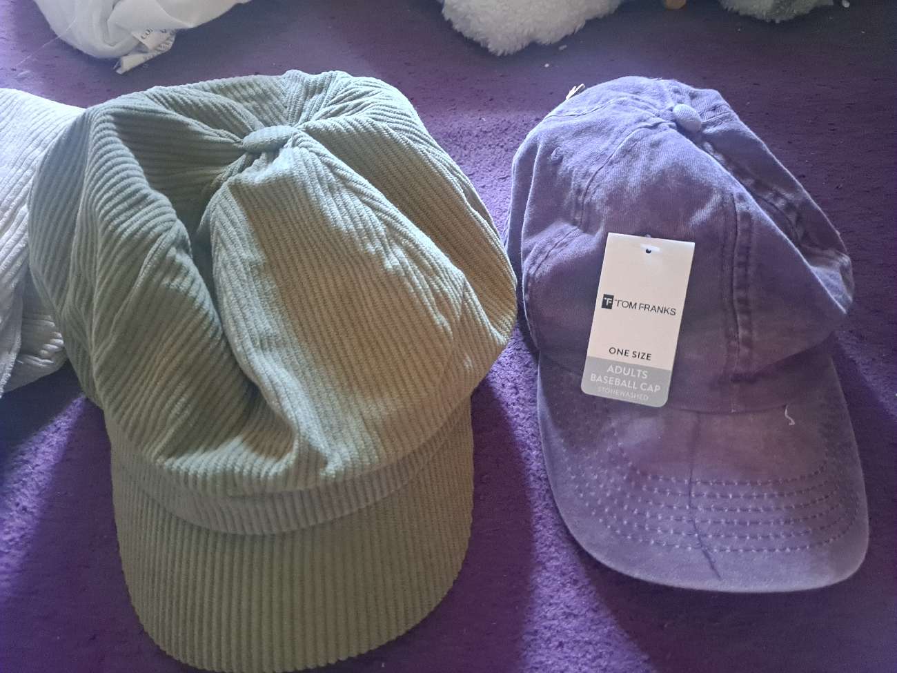 2 whimsical hats bought at British Heart Foundation for £12.00