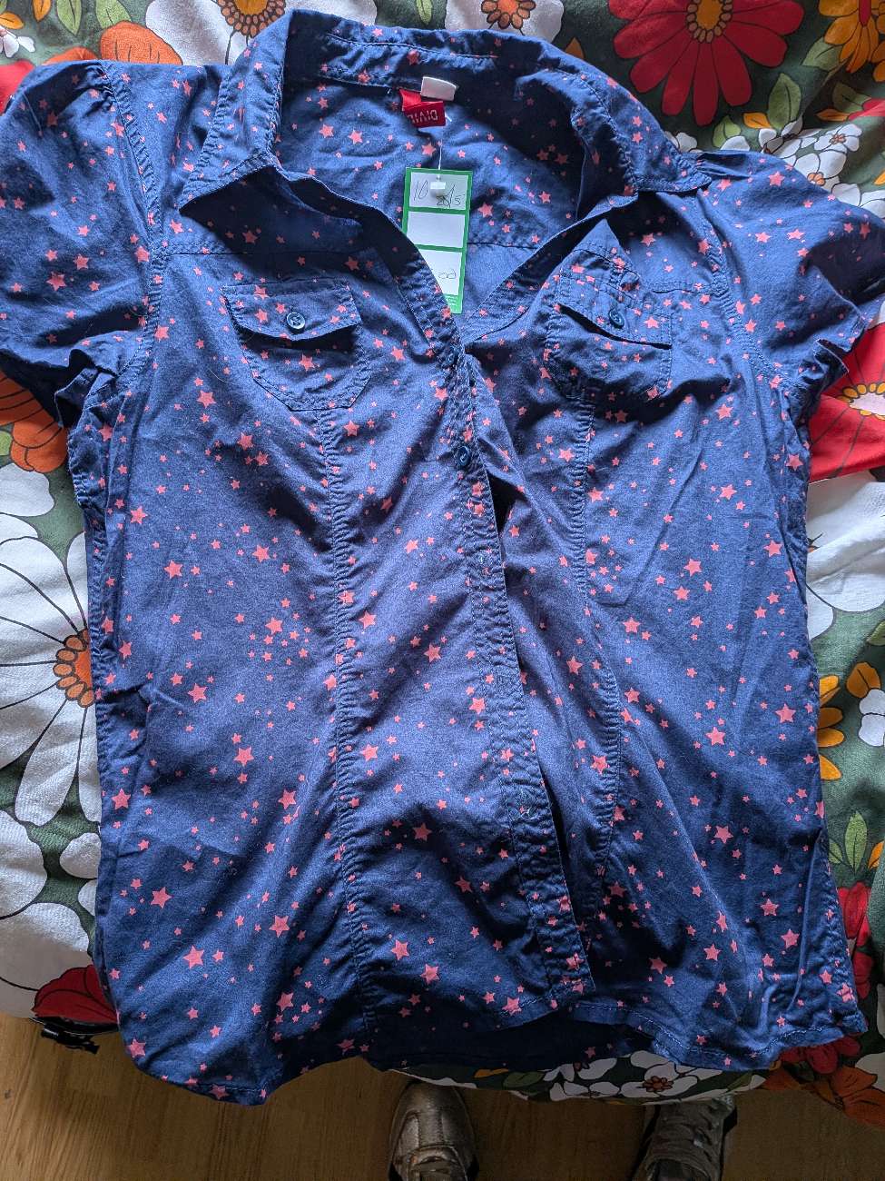 A new shirt bought at Cancer Research UK for £3.00