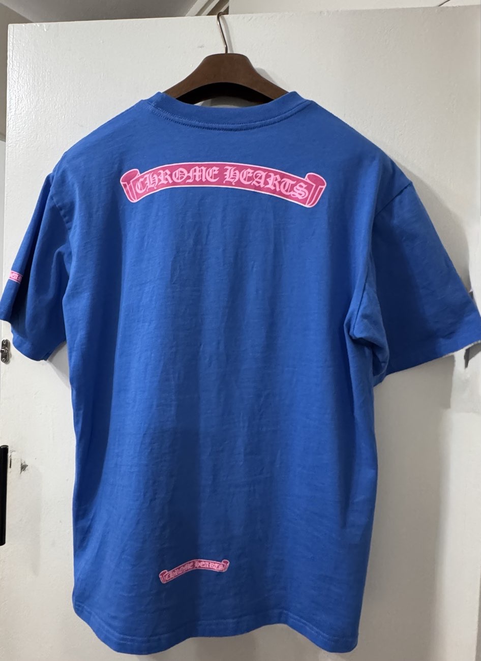 The “holy grail” of thrifting  = “Chrome Hearts”  t shirt product bought at TRAID for £50.00