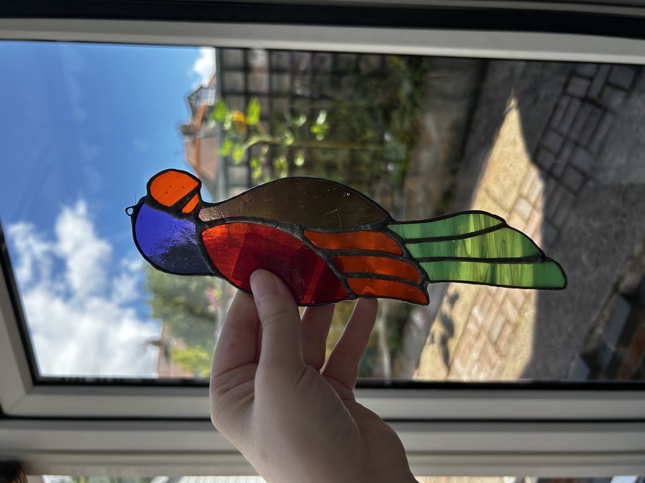 Stained Glass Parrot Suncatcher product bought at Sue Ryder for £3.00