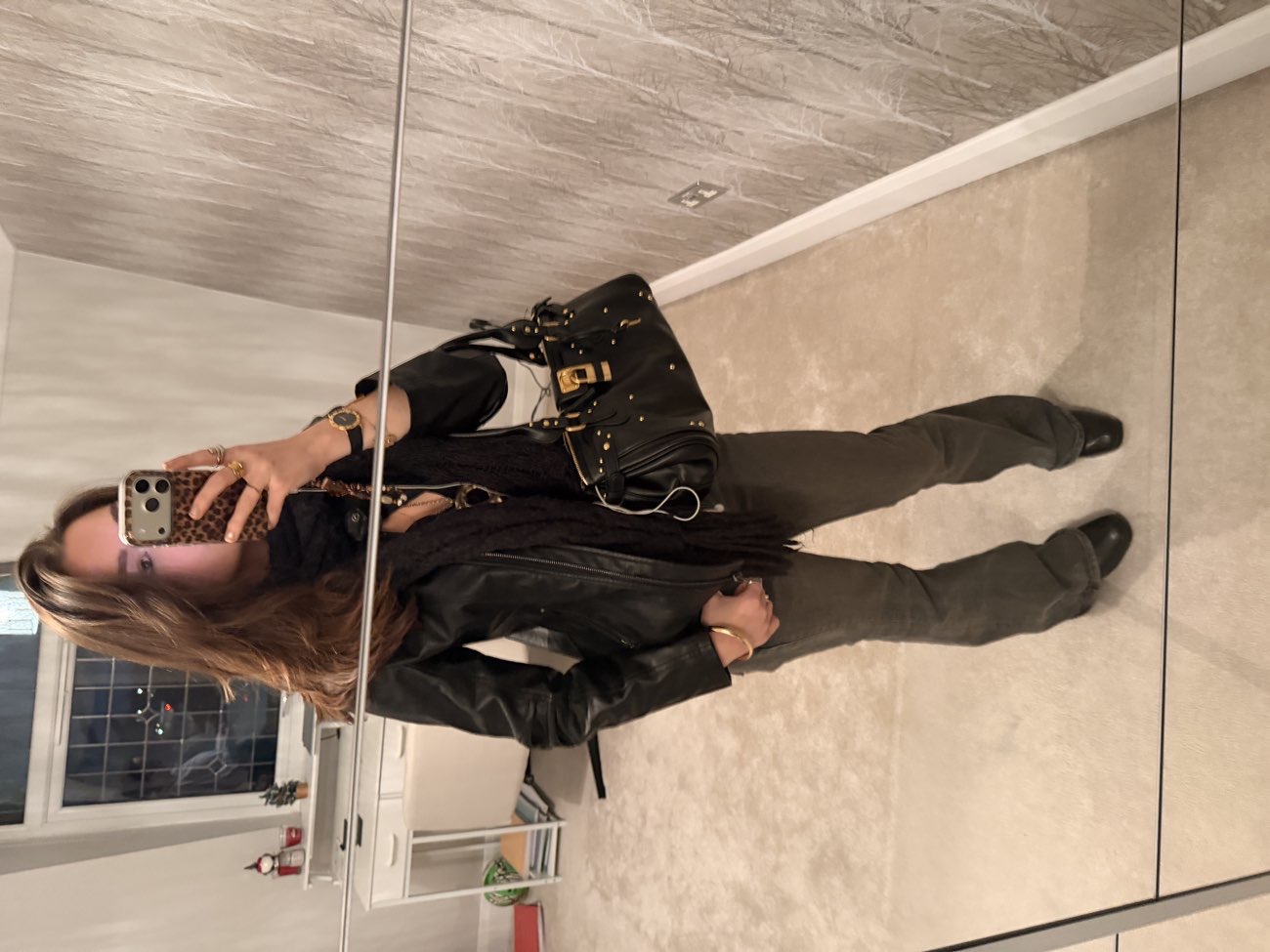 leather jacket bought at St Vincent's for Β£8.00