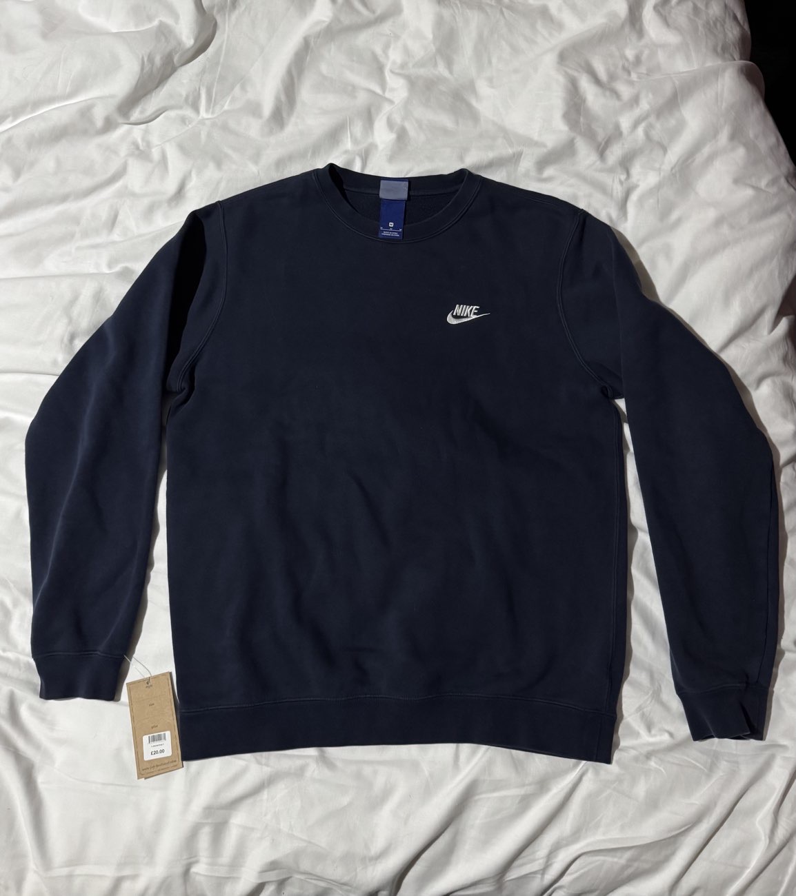 Navy Nike Crew neck jumper bought at Pop Boutique for £20.00