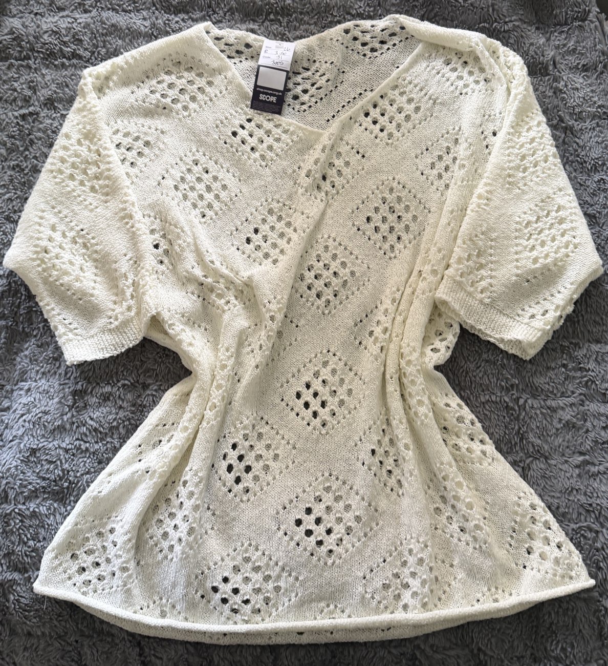 Light crochet style cover up product bought at Scope for £3.50