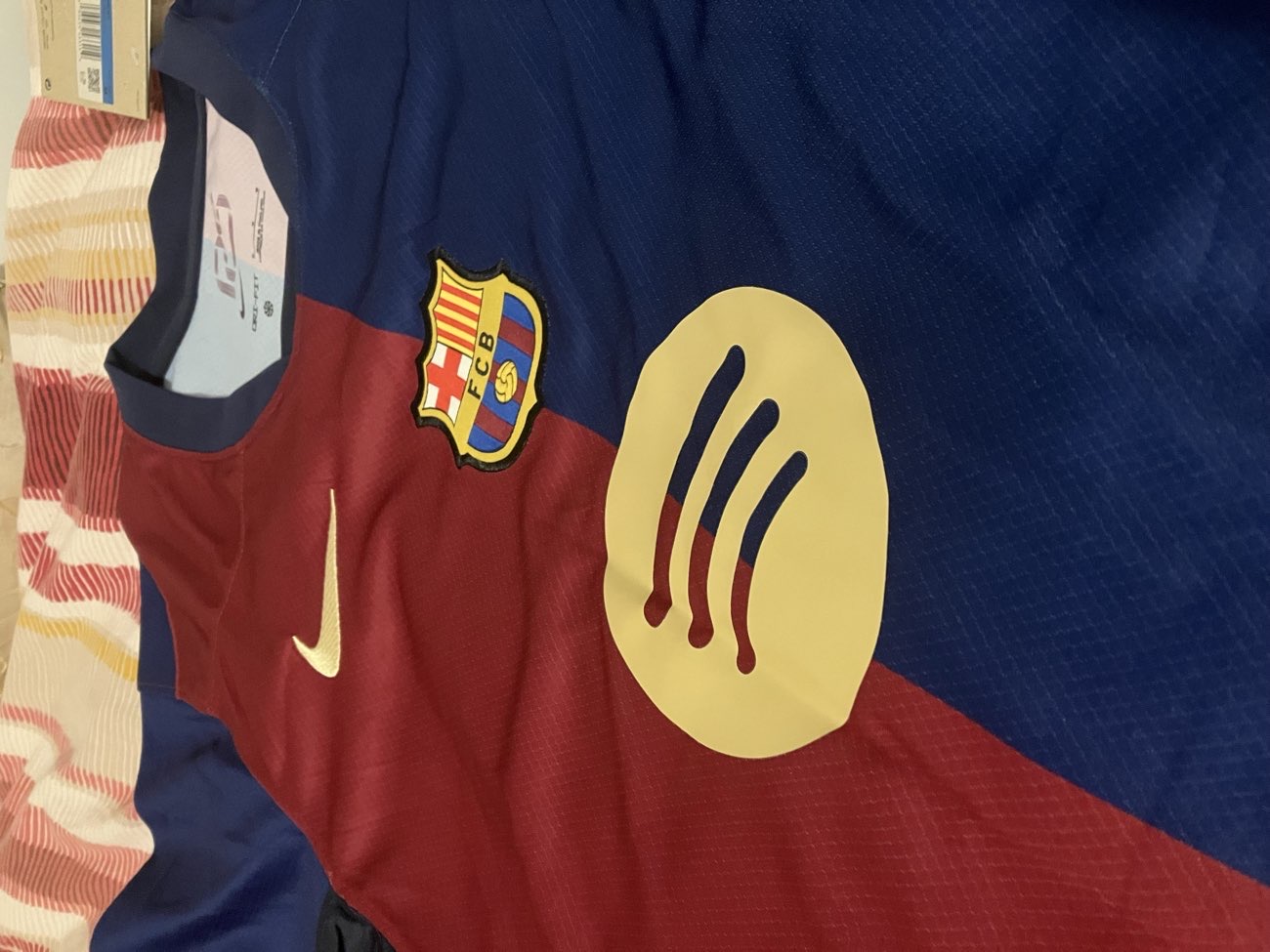 a Barcelona top bought at British Heart Foundation Home Store