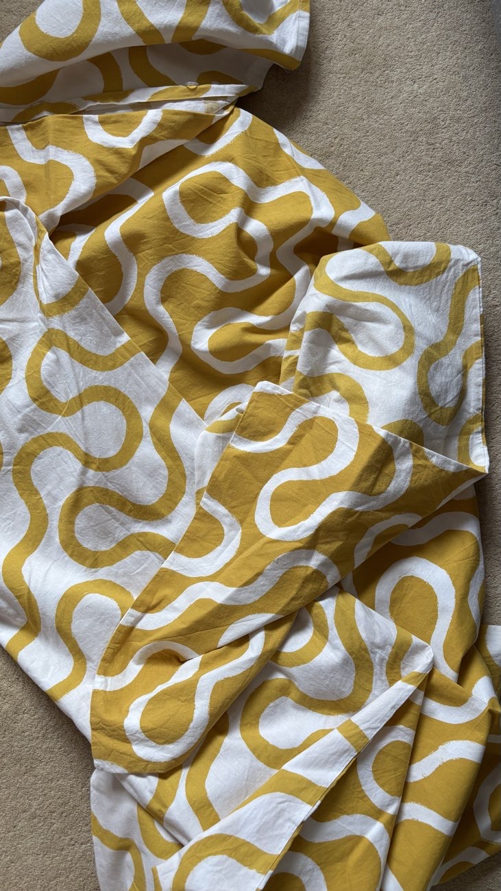 Some funky cotton bedding to upcycle into some trousers & a summer survival heatwave dress! product bought at Sue Ryder for £5.75