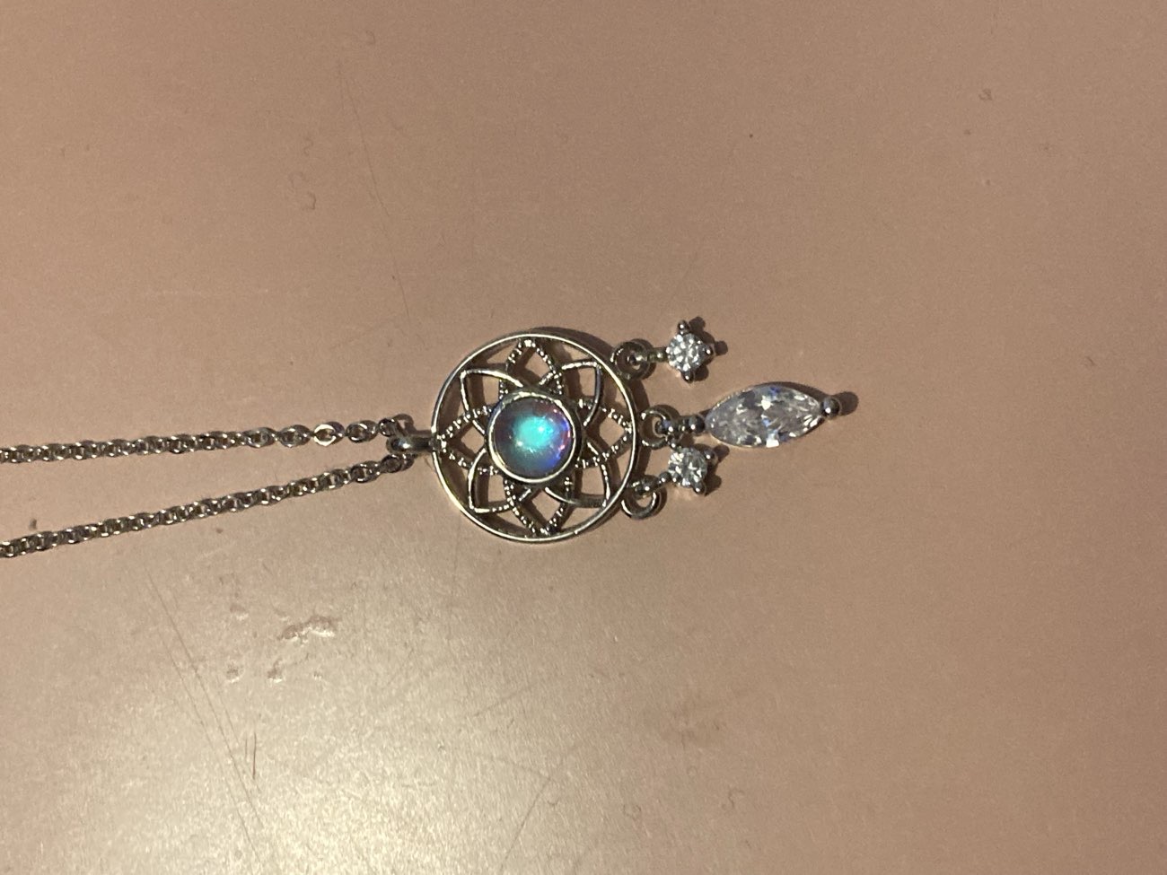 Dreamcatcher necklace bought at Borders Pet Rescue charity shop for £2.00